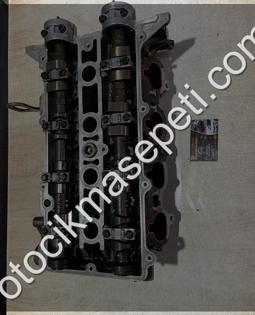 Mazda 626 dolu hatasız silindir kapağı 1998-2002 model